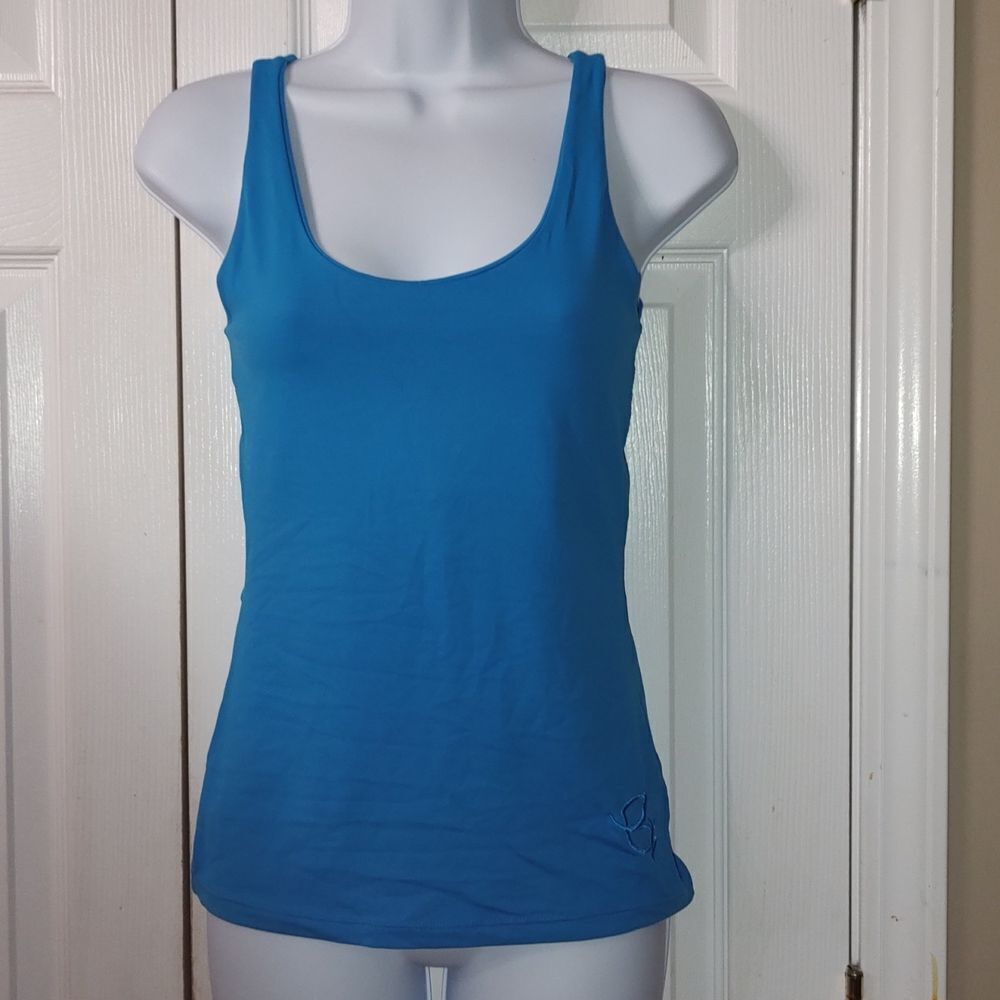 Equilibrium Activewear turquois tank strappy peek hole back  Sz M